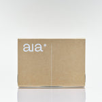 Aia Intimacy Essentials Box packaging featuring natural lubricant, massage oil, and stimulating gel in minimalist design.