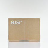 Aia Intimacy Essentials Box packaging featuring natural lubricant, massage oil, and stimulating gel in minimalist design.