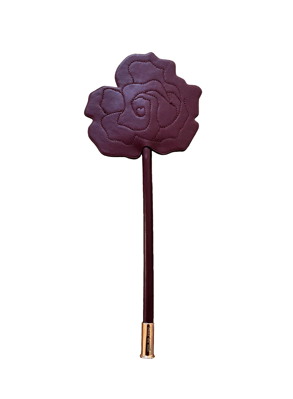 Mewmew Fleur du Mal Bordeaux leather rose-shaped paddle – luxury adult toy NZ, perfect for intimate play with lingerie and accessories.