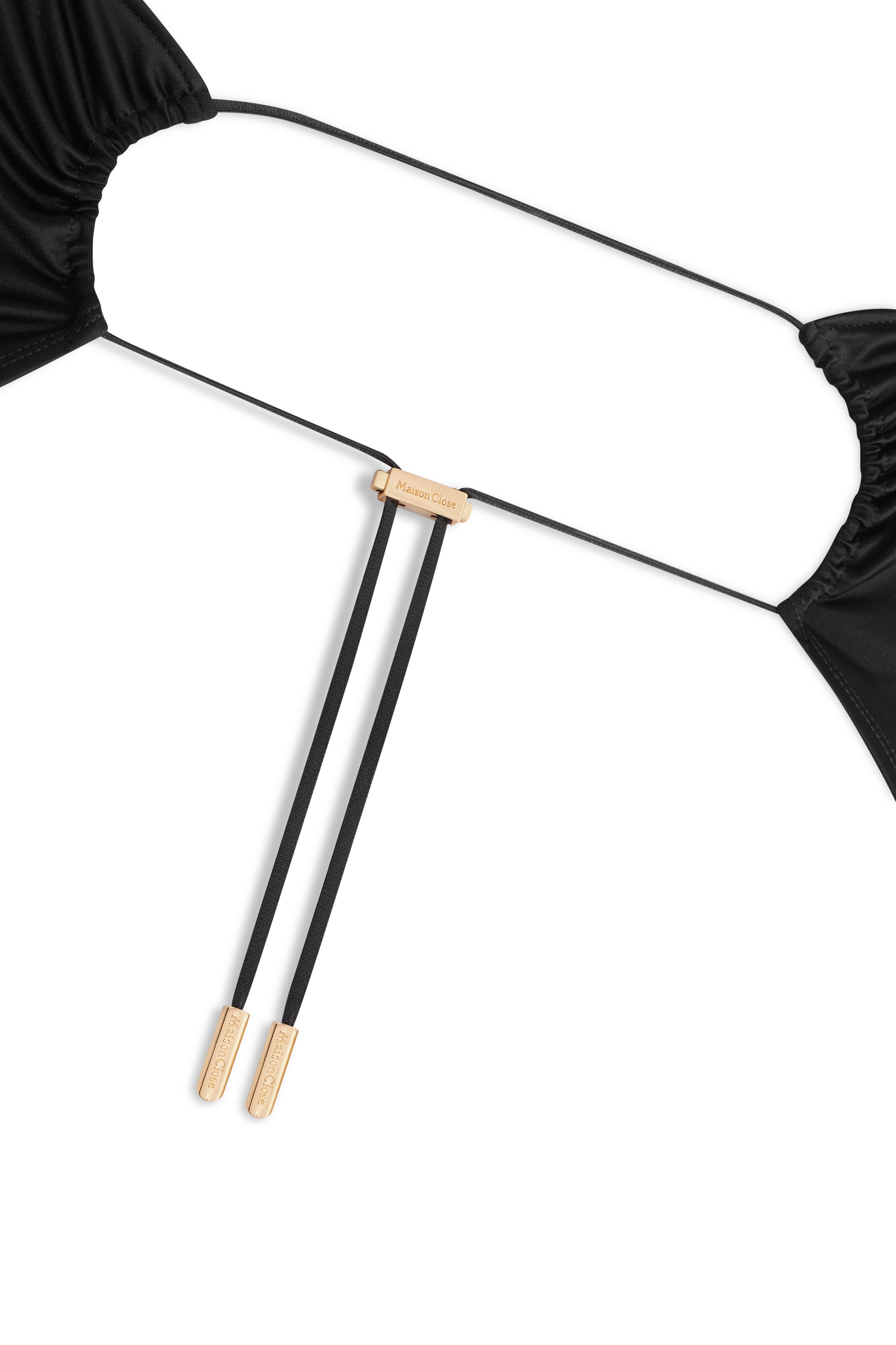 Close-up of black open-back catsuit detail – luxury lingerie NZ, ideal for intimate play with suspenders and sheer stockings.