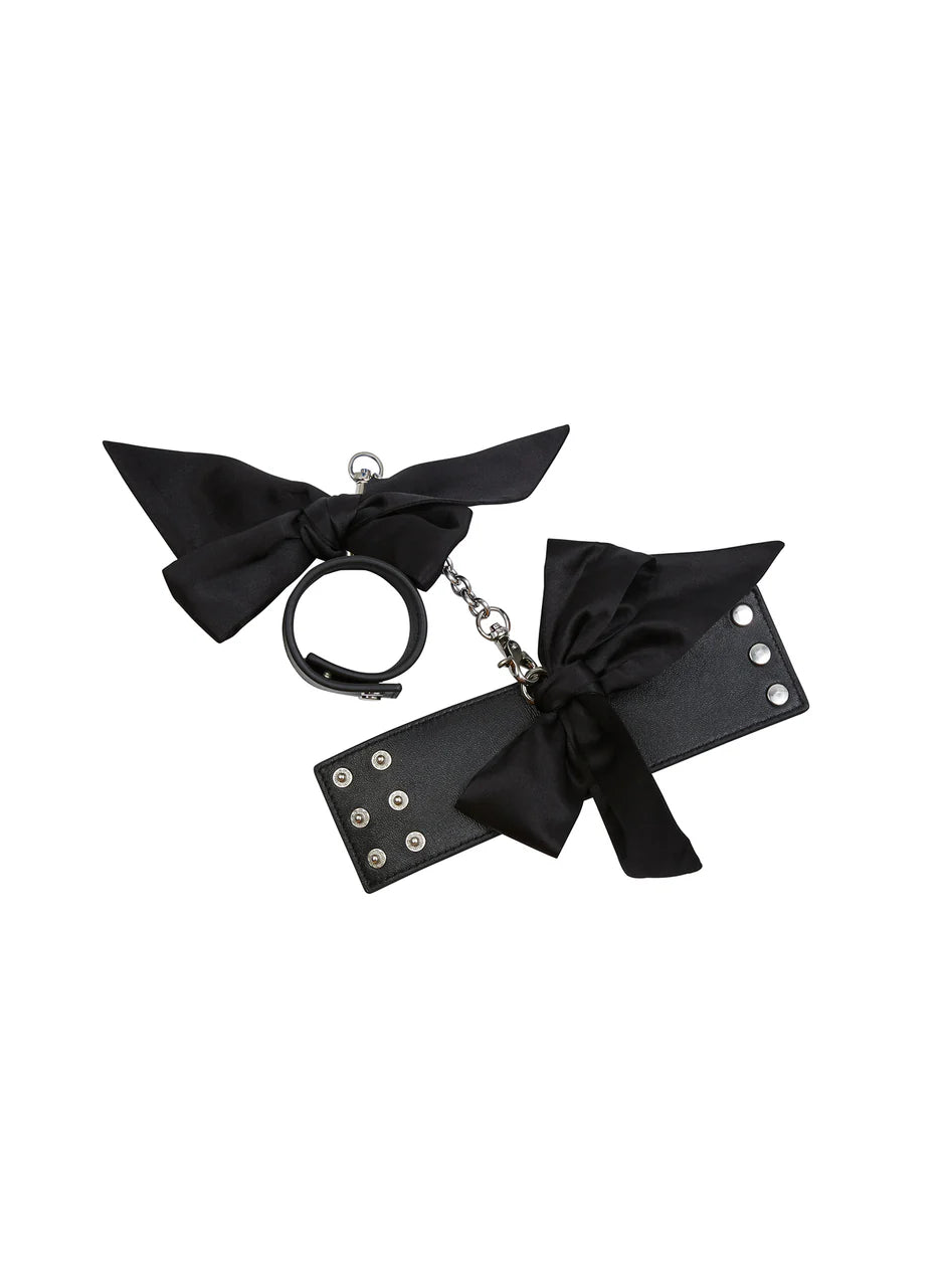 Black handcuffs – adult bondage accessory NZ, perfect for playful intimacy with blindfolds, cat masks, and sexy lingerie sets.